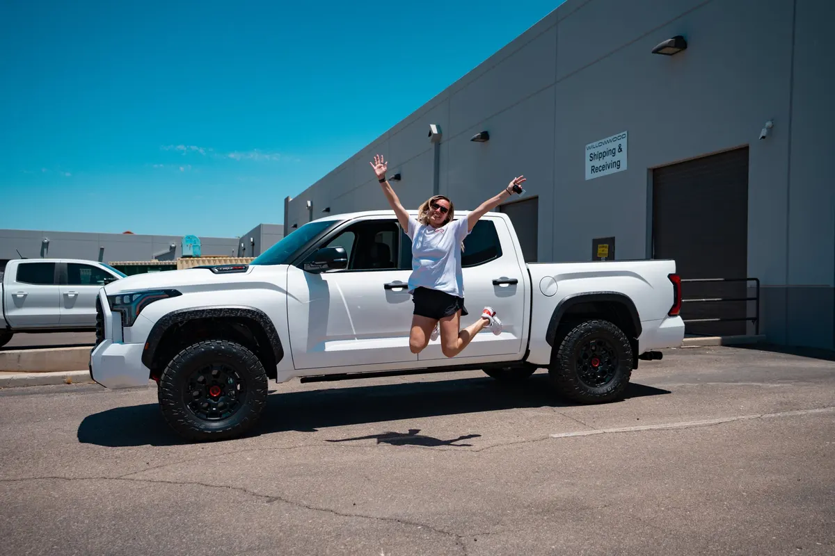 Tori C. with the Toyota Tundra TRD Pro she won in the Two Winners, One Drive fundraiser